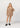 SALANIDA Merino Wool Pleated Mini Skirt in Beige | PICCOLO